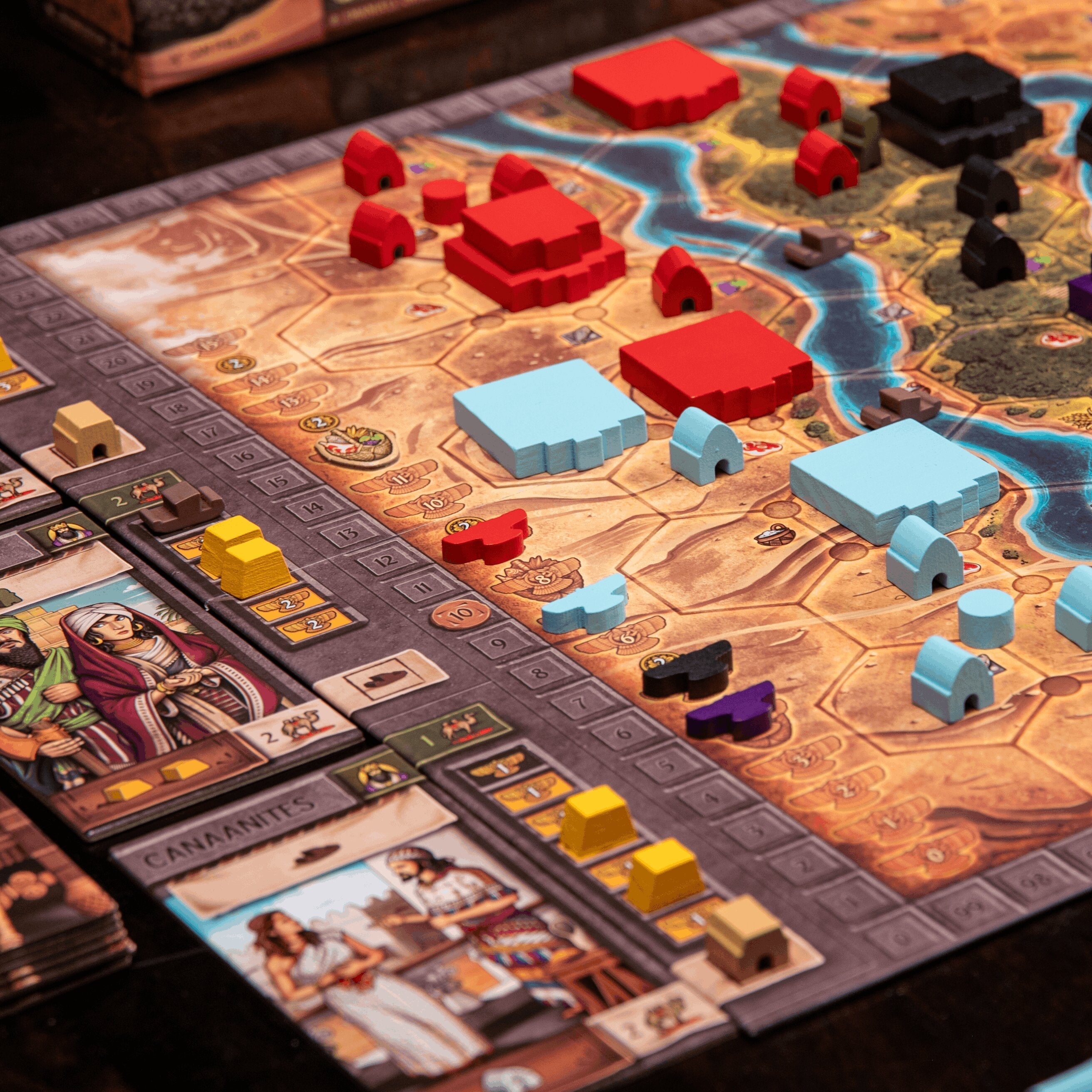 Board game with colorful pieces on a detailed map