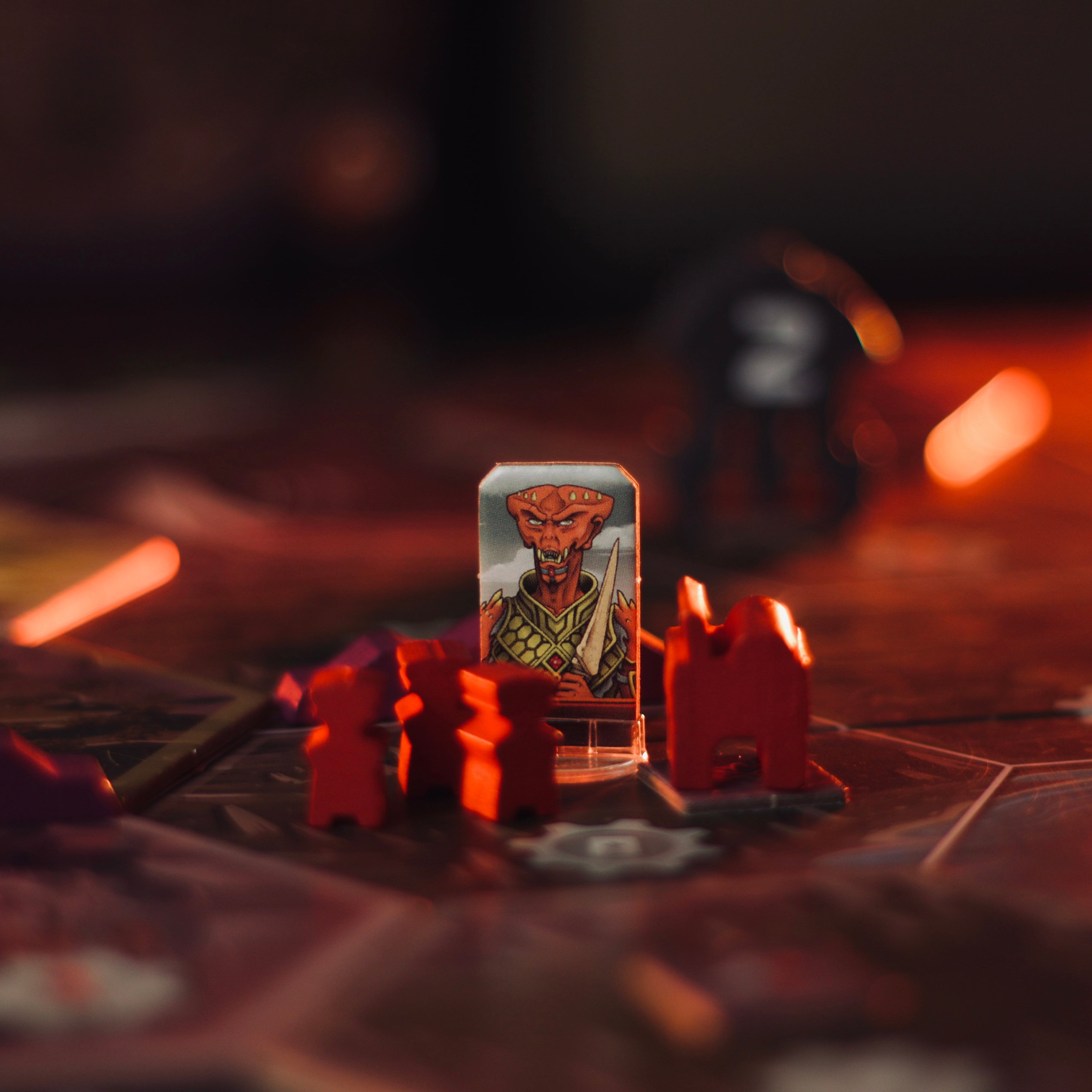 Board game piece with a character card on a game board