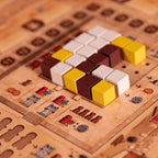 Close-up of a Ludo board game with dice showing various colors.