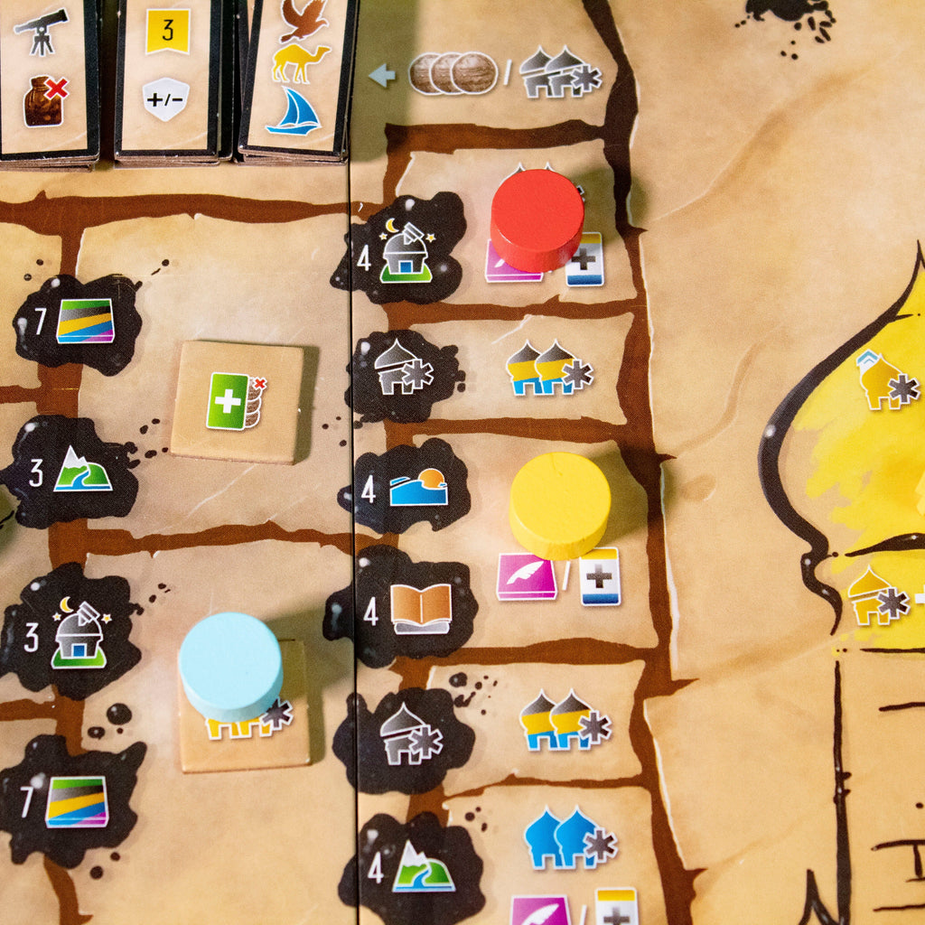 Board game with various icons and pieces on a map-like board