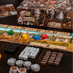 Board game setup with pieces and box on a wooden surface